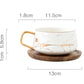 Marmormuster Kaffeetasse mit Goldverzierung