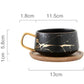 Marmormuster Kaffeetasse mit Goldverzierung