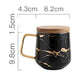 Marmormuster Kaffeetasse mit Goldverzierung