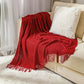 Gemütliche lila Diamant Strickdecke