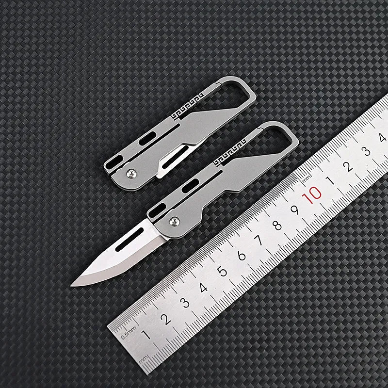Frendorf | Kompakt und mächtig: MGS Titanlegierung MINI Klappmesser mit hochfester D2-Klinge – Ein Schlüsselanhänger-Pendeln Taschenmesser für Outdoor EDC und Selbstverteidigung