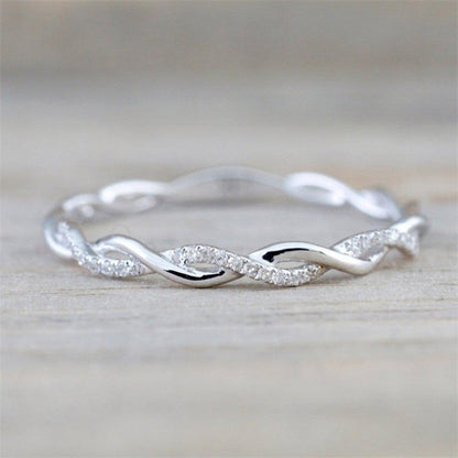 Frendorf | Geflochtener Ring mit Zirkonen in Gold und Silber