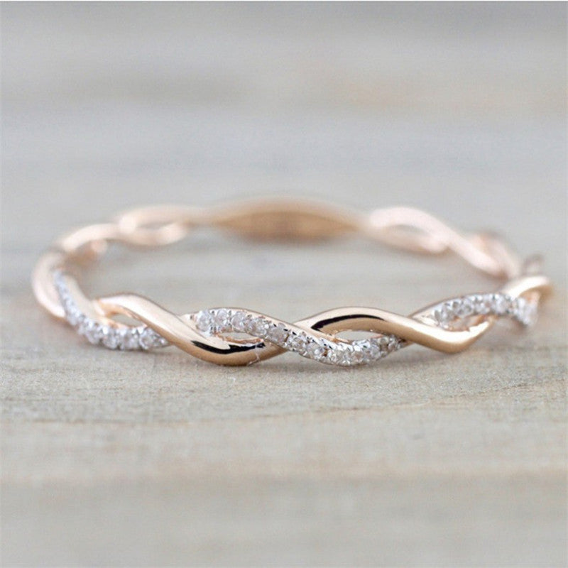 Frendorf | Geflochtener Ring mit Zirkonen in Gold und Silber