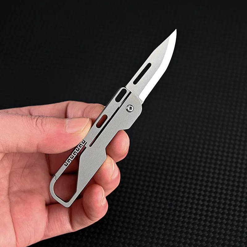 Frendorf | Kompakt und mächtig: MGS Titanlegierung MINI Klappmesser mit hochfester D2-Klinge – Ein Schlüsselanhänger-Pendeln Taschenmesser für Outdoor EDC und Selbstverteidigung