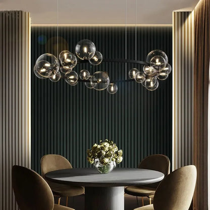 Moderne kreative Metall-Kronleuchter-Beleuchtung: 7/10 klare Glasblasen, langes rundes Design mit G9 Lichtfassung