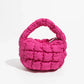 Lebhaftes kreuzgequiltetes rundes Mini-Tasche