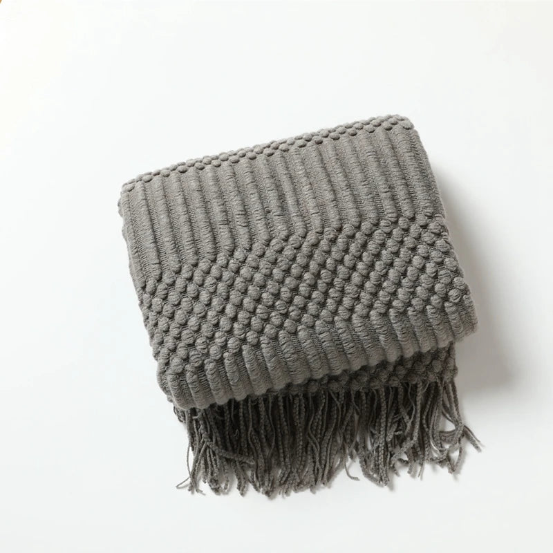 Gemütliche lila Diamant Strickdecke