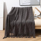 Gemütliche lila Diamant Strickdecke