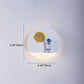 Zeitgenössische kreative Eisenharz runde Astronaut LED Wandleuchte Lampe für Schlafzimmer