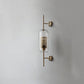 Frendorf | Lumivault Industrial Wandlampe | Zylindrischer Glasschirm | Eisenrahmen | Deko für Schlafzimmer & Wohnräume