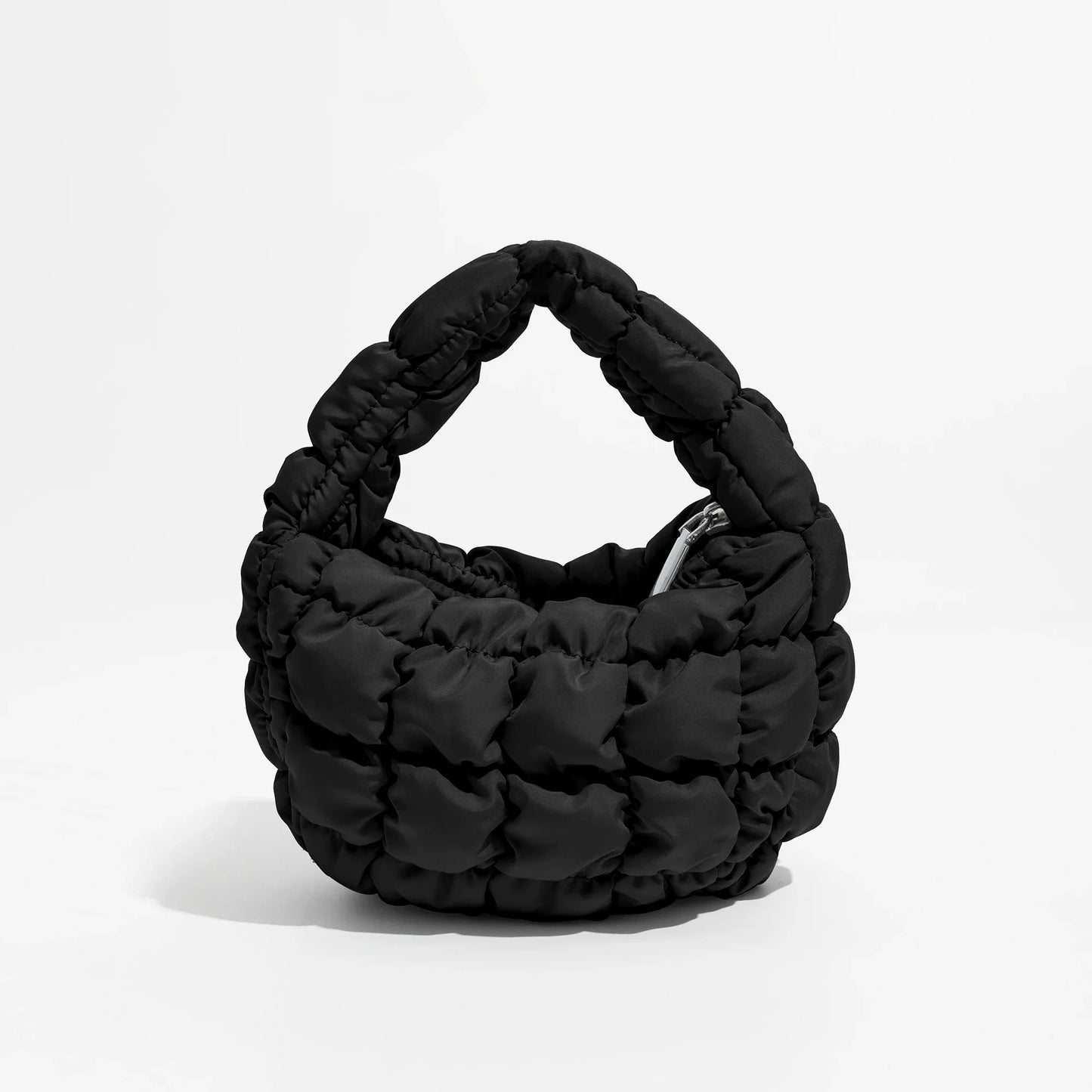 Lebhaftes kreuzgequiltetes rundes Mini-Tasche