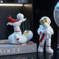 Heimdekor Moderne Wohnzimmer Schreibtischdekoration Zubehör Einfache Vater und Sohn Astronaut Figurine Süße Harz Einrichtung Handwerk