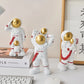 Heimdekor Moderne Wohnzimmer Schreibtischdekoration Zubehör Einfache Vater und Sohn Astronaut Figurine Süße Harz Einrichtung Handwerk