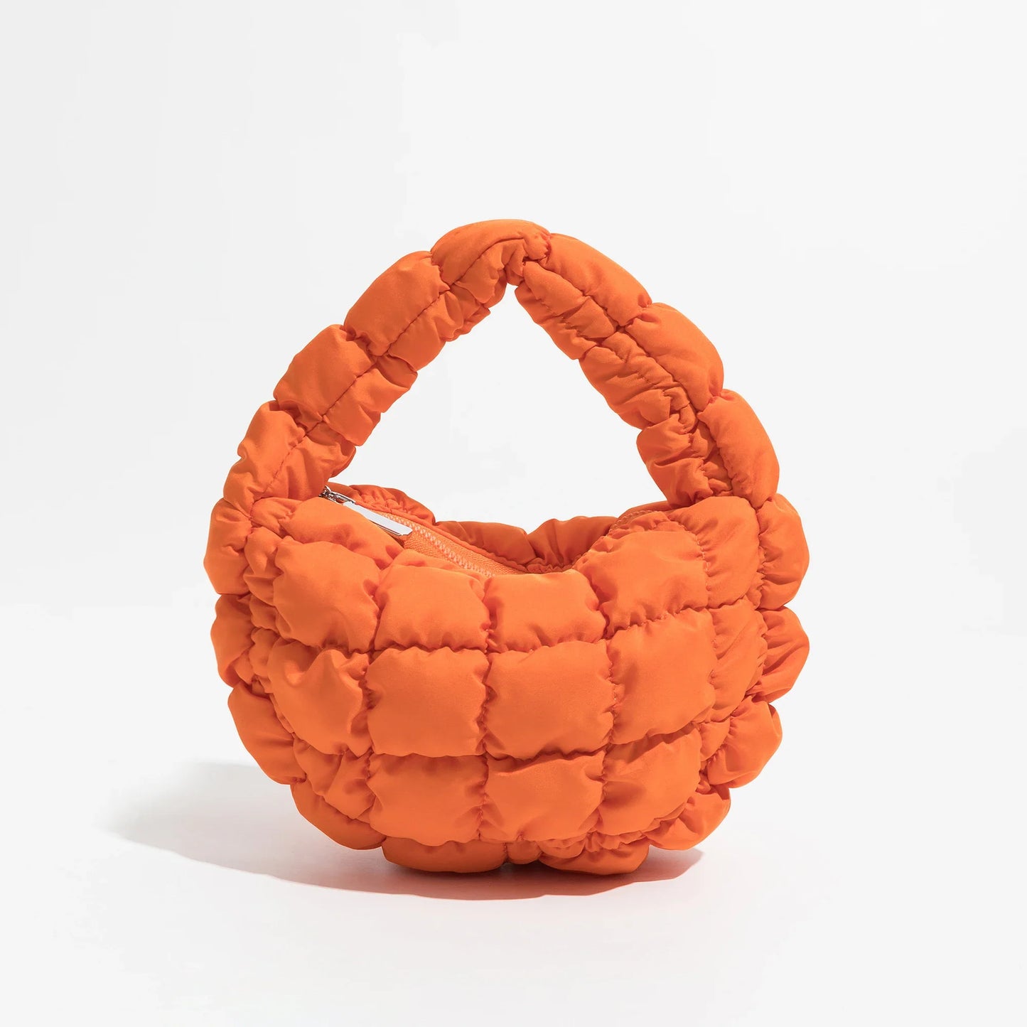 Lebhaftes kreuzgequiltetes rundes Mini-Tasche
