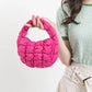 Lebhaftes kreuzgequiltetes rundes Mini-Tasche
