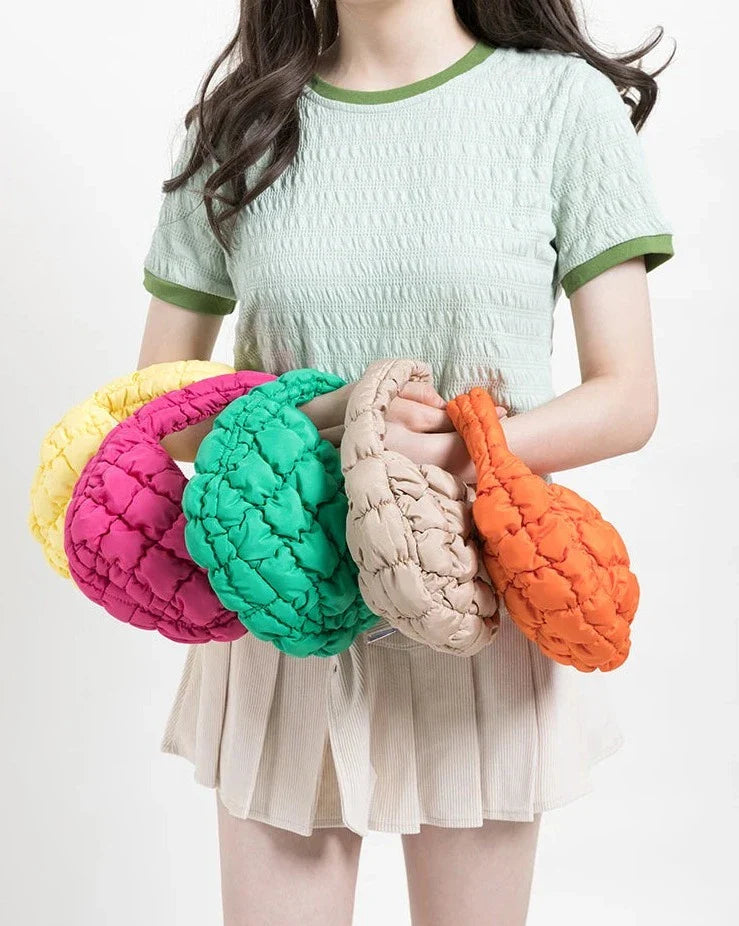 Lebhaftes kreuzgequiltetes rundes Mini-Tasche
