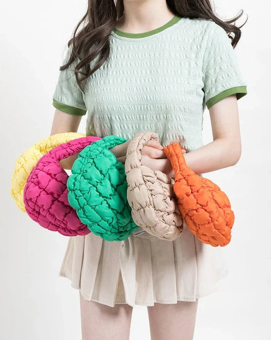 Lebhaftes kreuzgequiltetes rundes Mini-Tasche