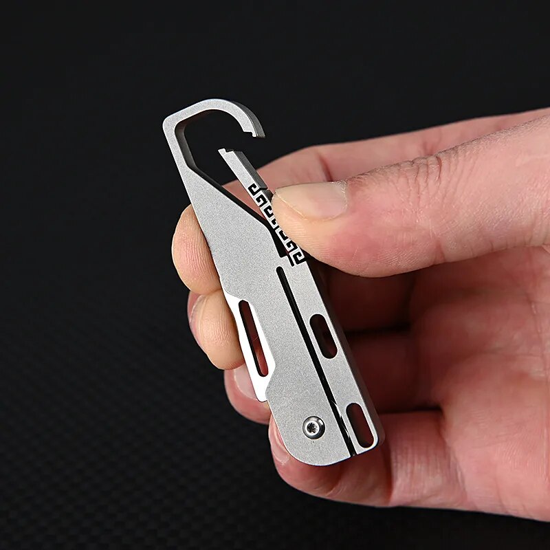 Frendorf | Kompakt und mächtig: MGS Titanlegierung MINI Klappmesser mit hochfester D2-Klinge – Ein Schlüsselanhänger-Pendeln Taschenmesser für Outdoor EDC und Selbstverteidigung