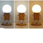 Nordische Holz-Roboter-Tischlampe