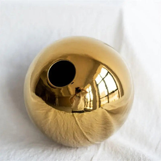 Goldene Kugelvase