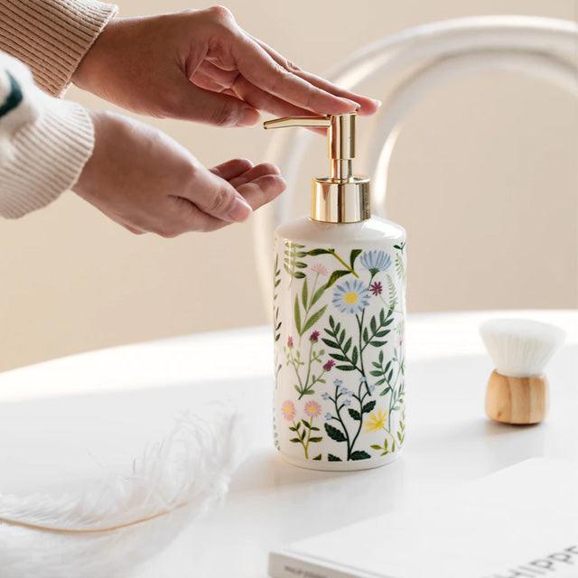 Seifenspender aus Keramik mit Blumenmotiv