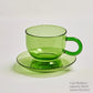 Grüne Glas-Teetasse & Untertasse Sets