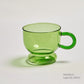 Grüne Glas-Teetasse & Untertasse Sets