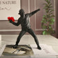 Emrys - Banksy Blumenprovokateur
