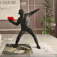 Emrys - Banksy Blumenprovokateur