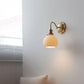 Frendorf | Elegante Messing Wandlampe für einen traditionellen Flair