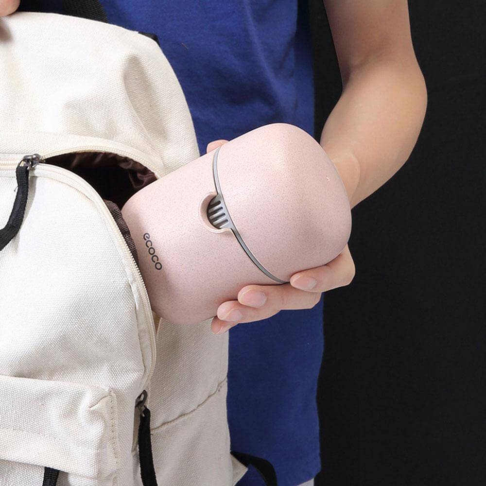 Portabler einfacher Pastell Mini Entsafter