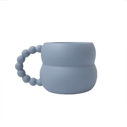 CREAMY BUBBLE HANDLE TASSE