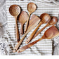 7-teiliges Utensilienset aus Teakholz