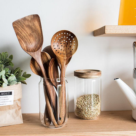 7-teiliges Utensilienset aus Teakholz
