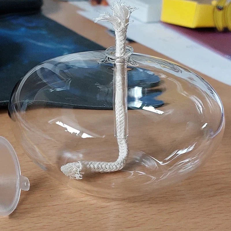 Transparente Öllampe aus Glas als Kerzenständer