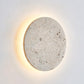 Frendorf | Bringen Sie Wärme mit der runden Wandleuchte aus Travertinstein