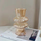 Wellenförmige Glasblumenvase