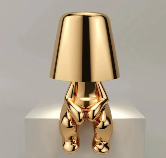 Kleine goldene Mann Tischleuchte