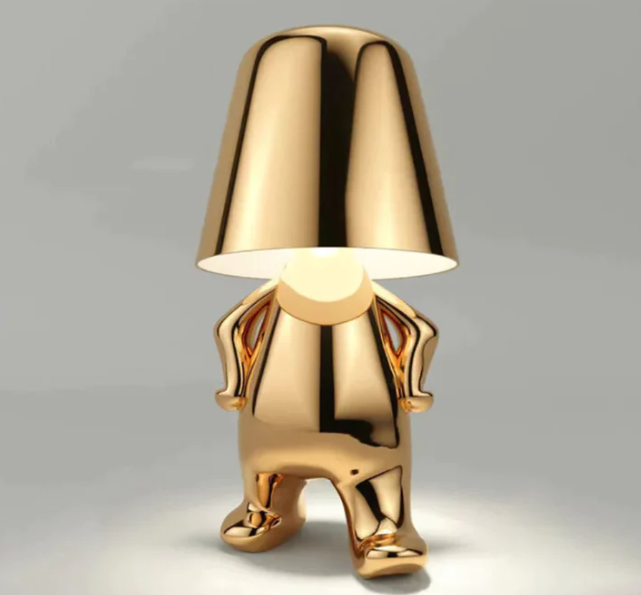 Kleine goldene Mann Tischleuchte