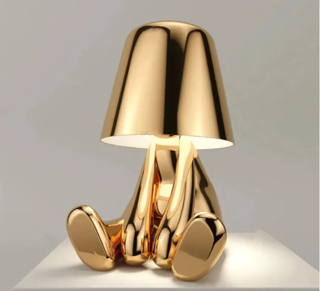 Kleine goldene Mann Tischleuchte